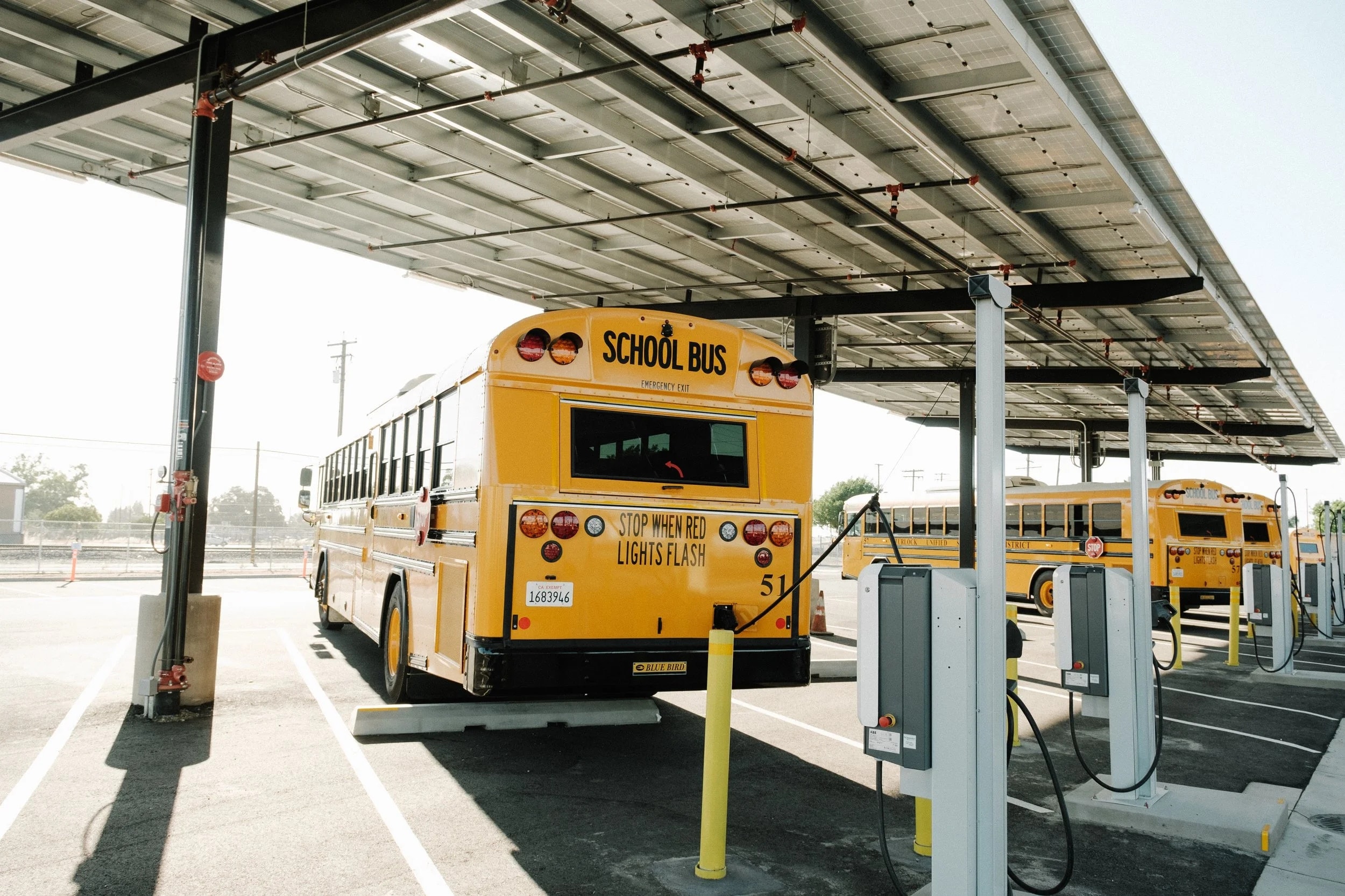 Electric school bus at the charging canopy